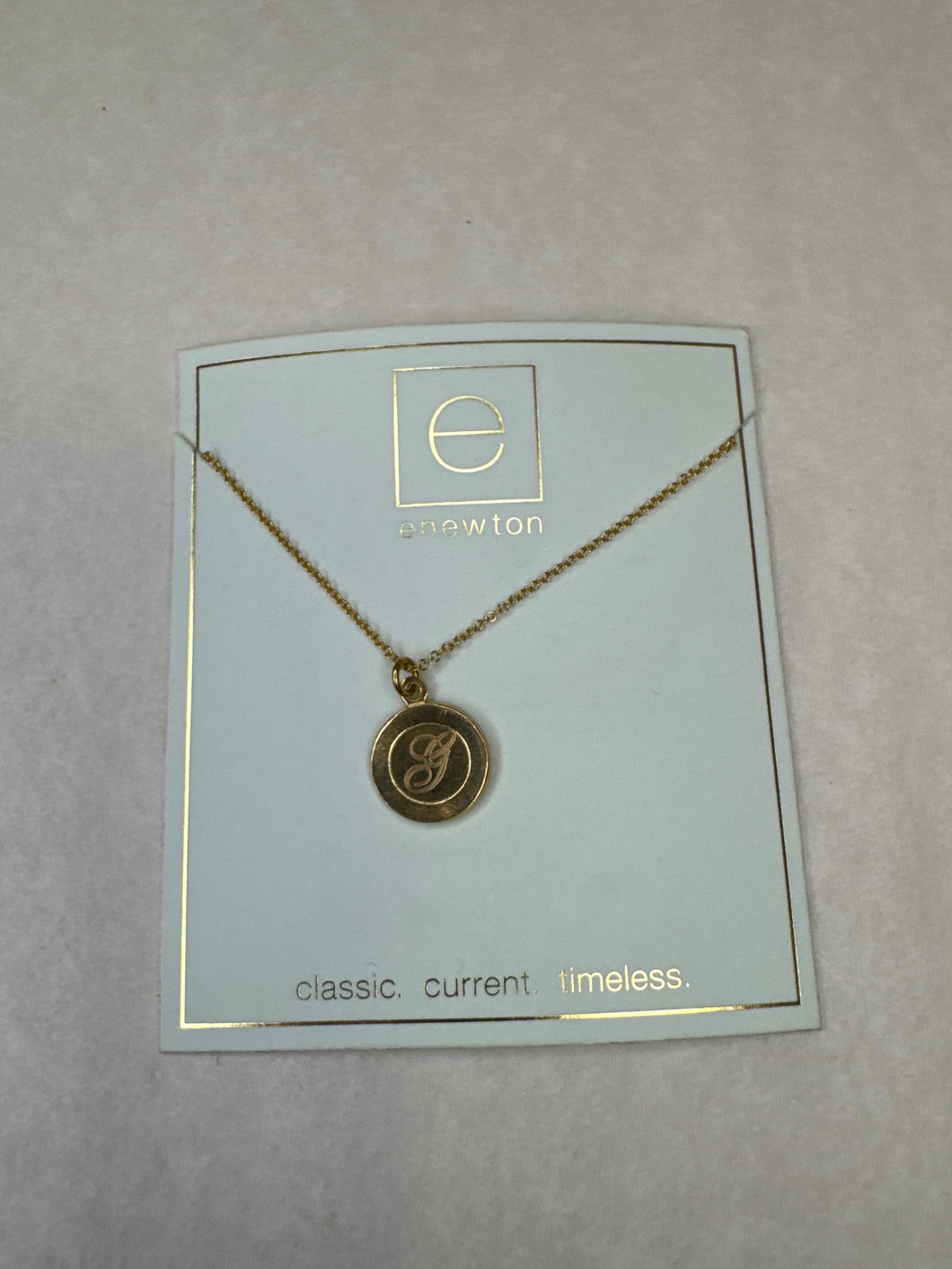 Gold G necklace